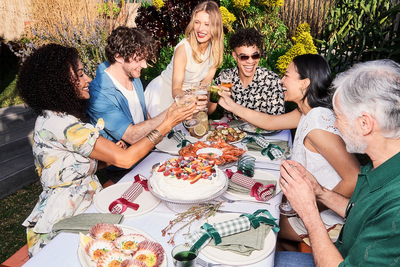 A family at a festive lunch with food and drinks