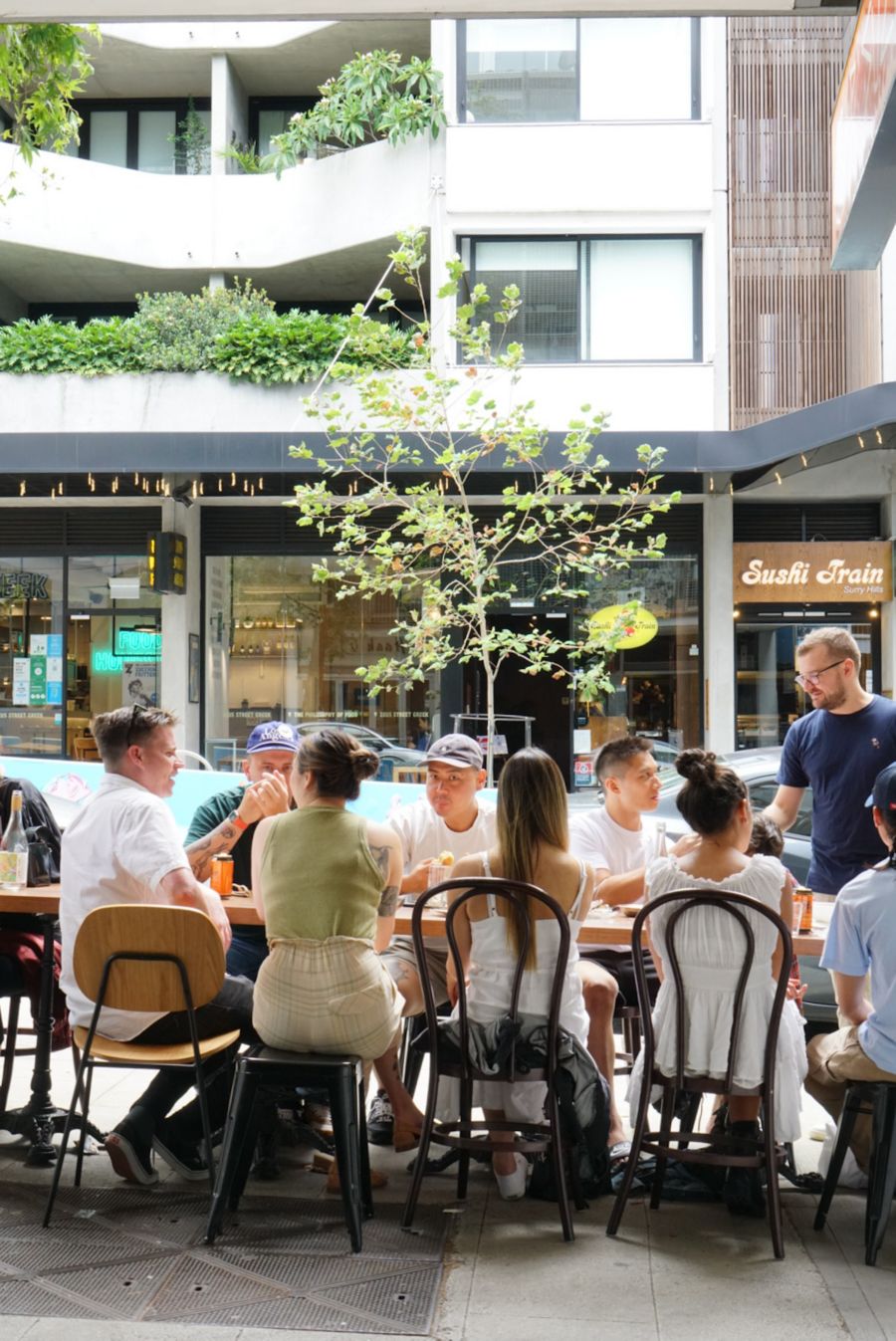 A group sitting outside at Bar Suze in Sydney