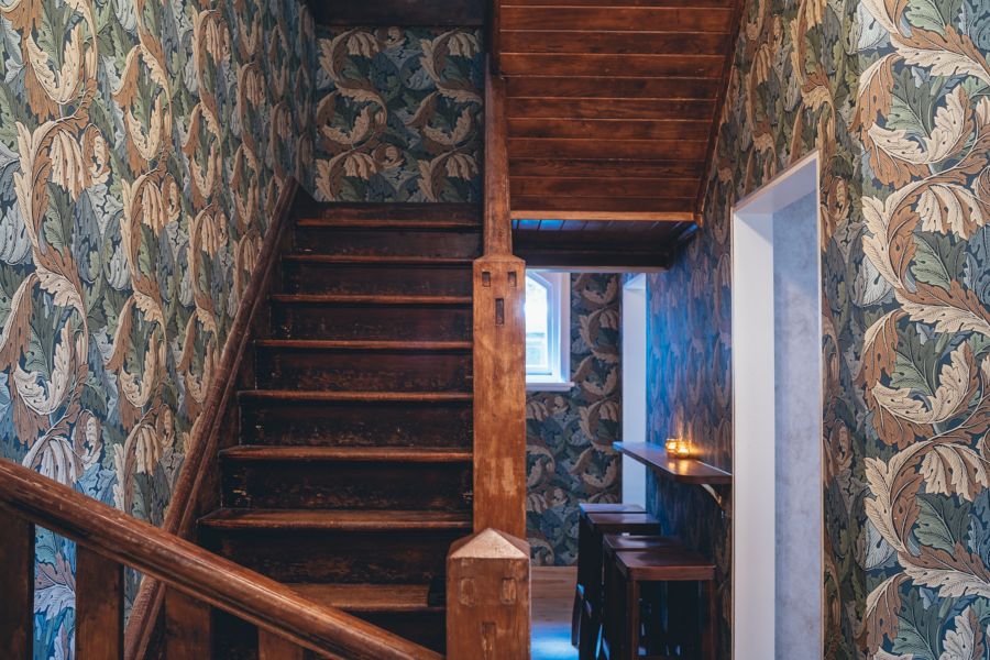 The striking wallpaper at Caretaker’s Cottage in Melbourne