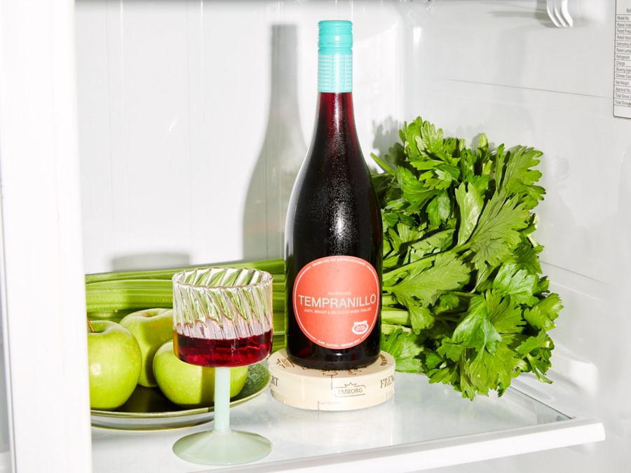 Brown Brothers Refreshing Tempranillo in the fridge with a glass