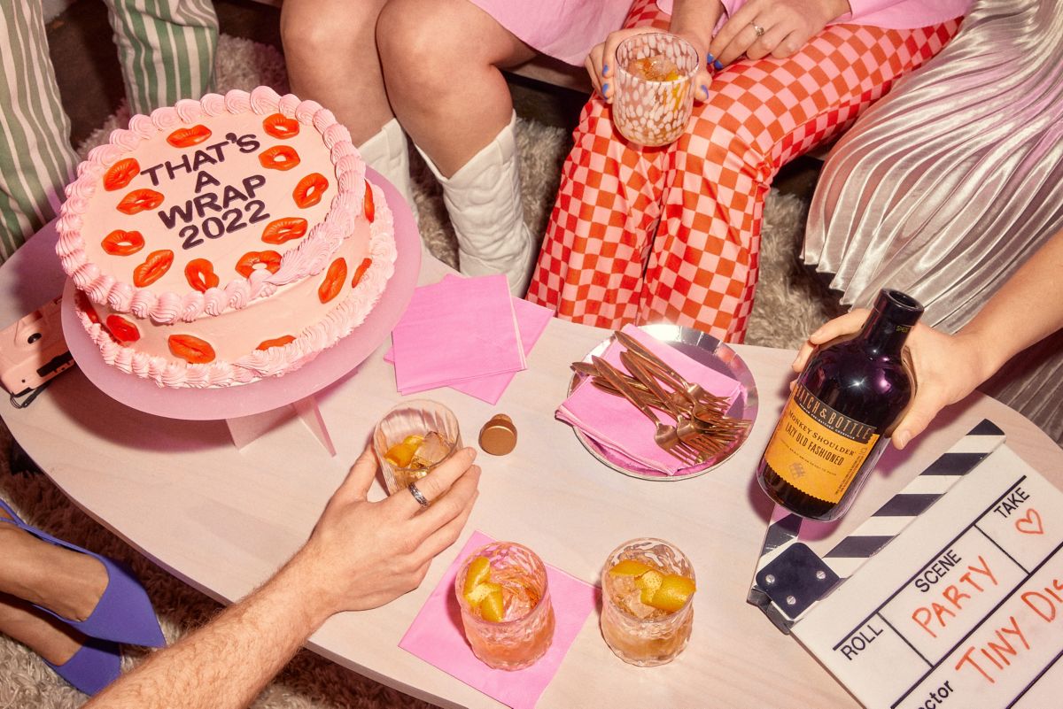 Cake and old fashioned cocktails being served to Tiny Disco team