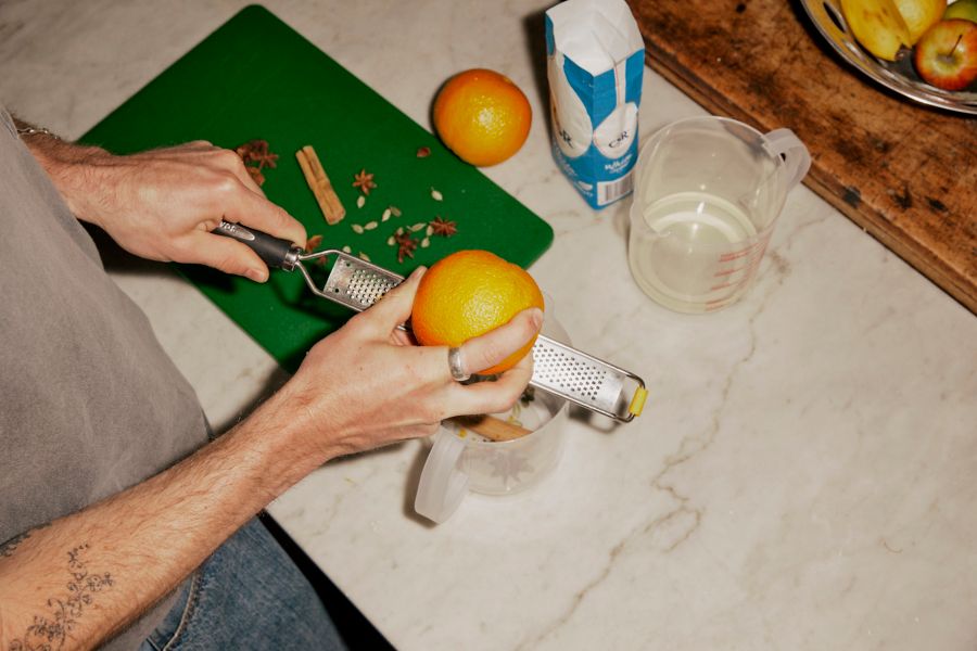 Zesting an orange for vermouth