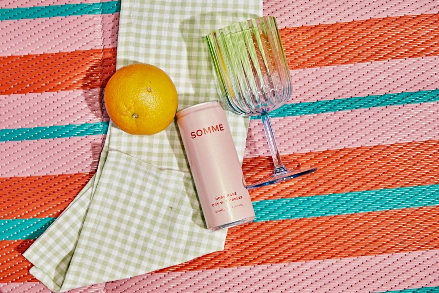 Somme Rosé Dry with Bubbles on a picnic rug