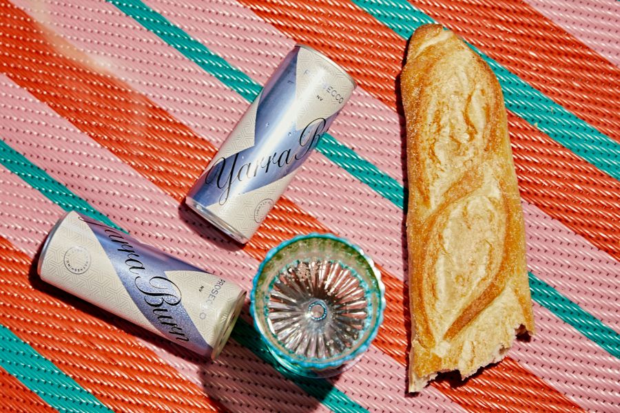Yarra Burn Cuvee Prosecco cans at a picnic
