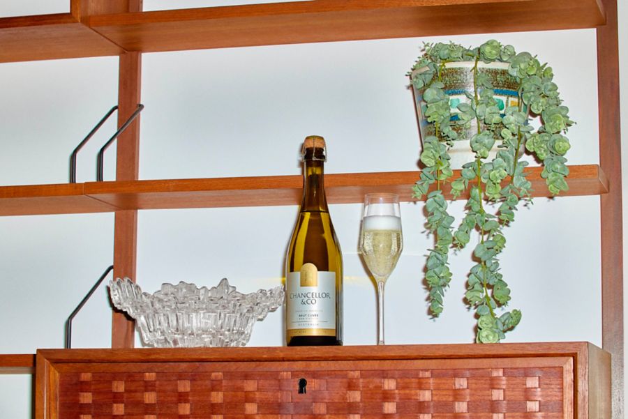 The Chancellor & Co Brut Cuvee next to a glass of the sparkling wine