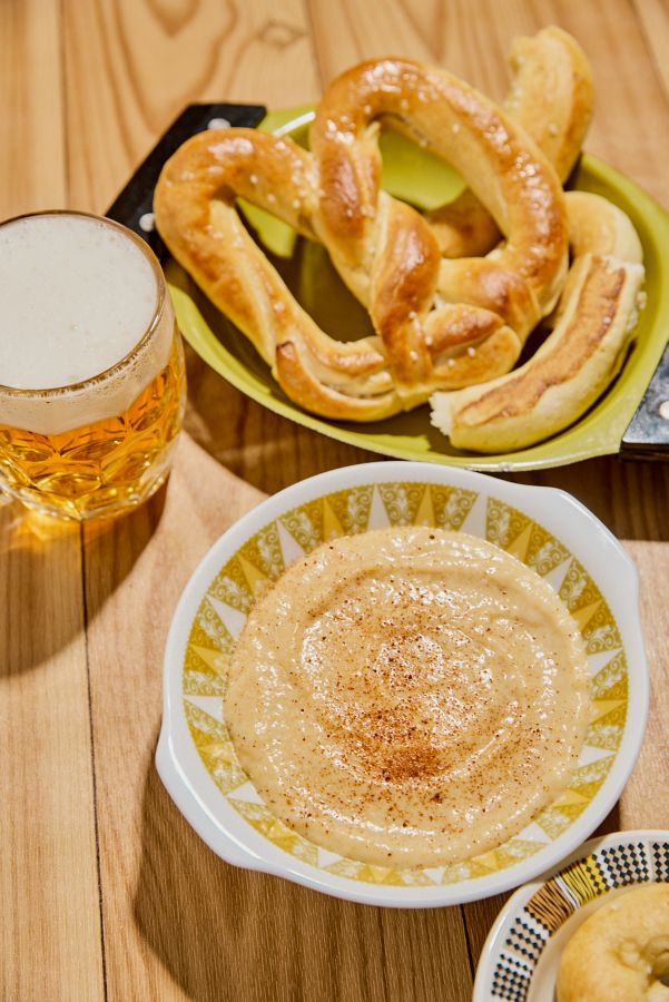 Beer cheese dip served with pretzels