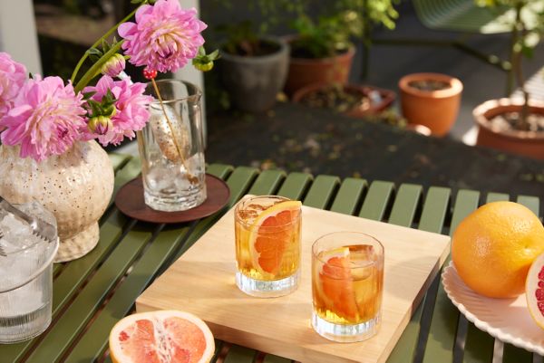 Two MonteNegroni cocktails on an outdoor table
