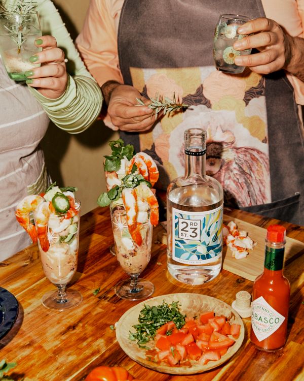 Kitchen table with entree and gin & tonics using 23rd st gin