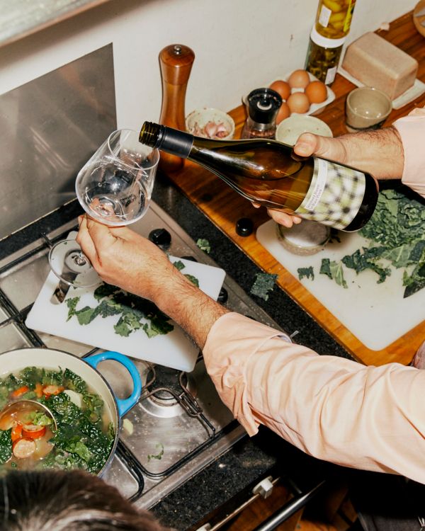 Cooking and pouring wine