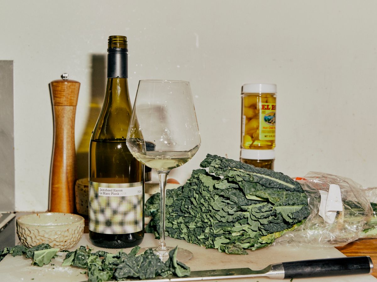 Bottle of wine and kale
