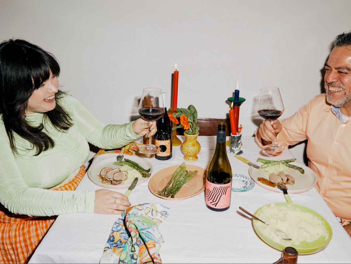 Dinner table with food and wine