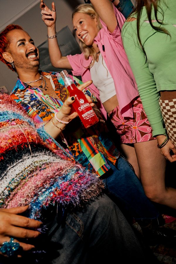 Sean and friends dancing in the living room and drinking Vodka Cruisers