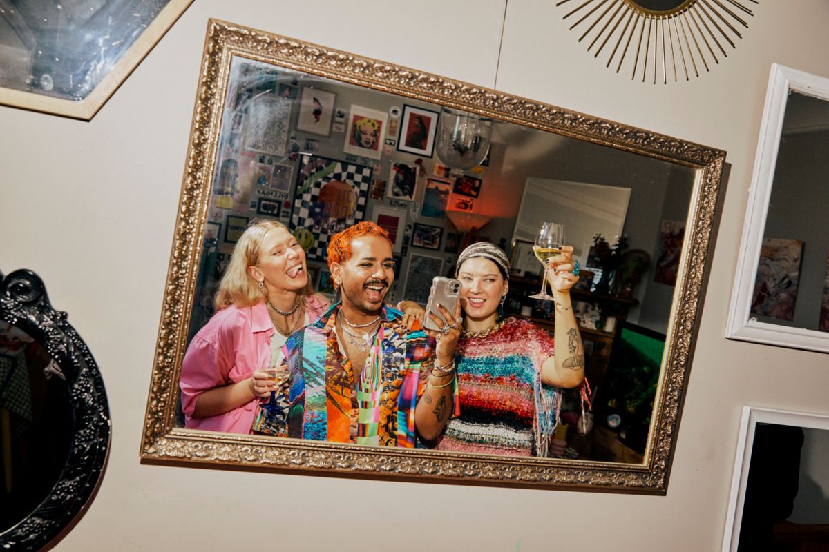 Sean, Eden and Ella taking selfies in the mirror