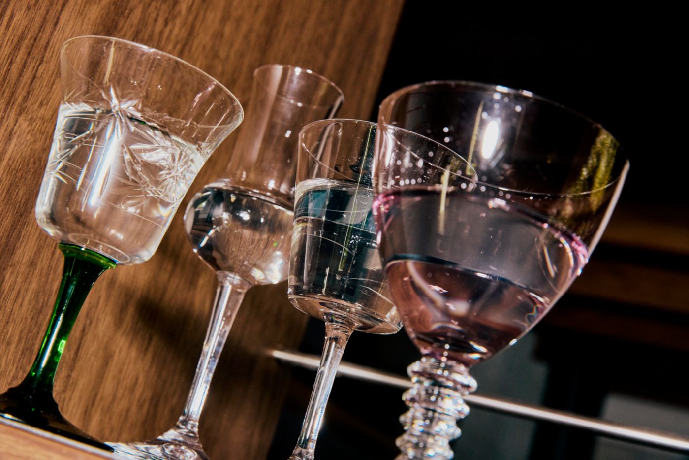 Various glasses holding liqueurs and spirits