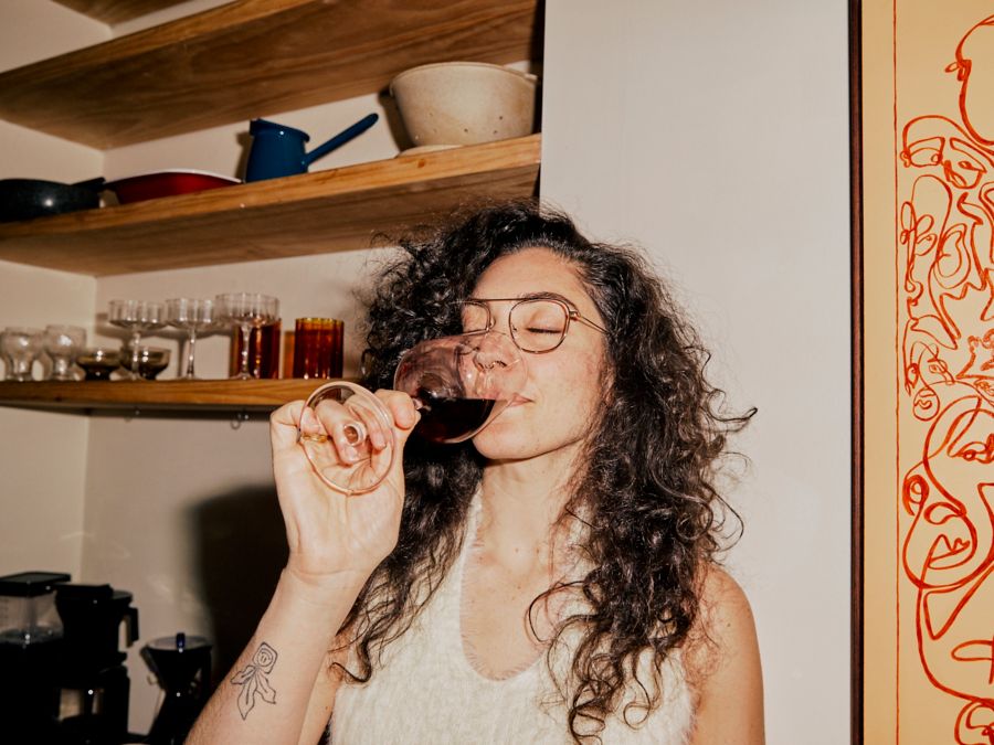 Woman drinking red wine