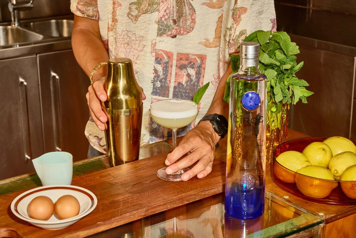 Holding a Blushed Lychee Sour cocktail, as made by Brendan Pang