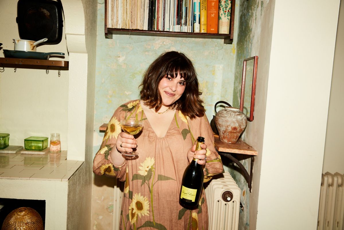 Julia with bottle of Champagne