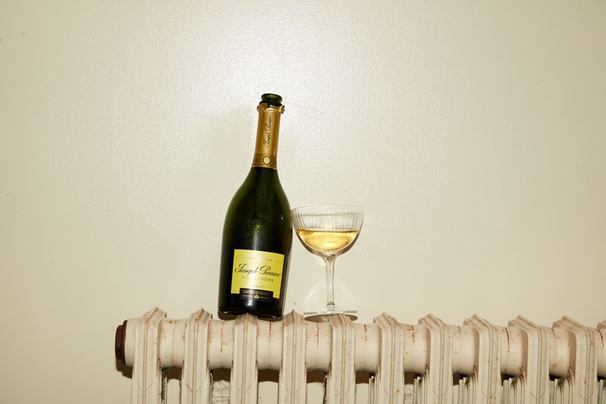 Bottle of champagne and glass