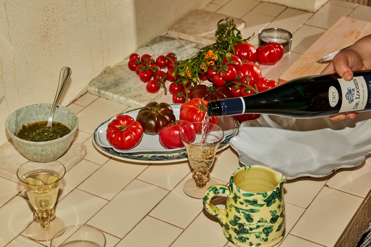 Julia pouring Dr Loosen Riesling