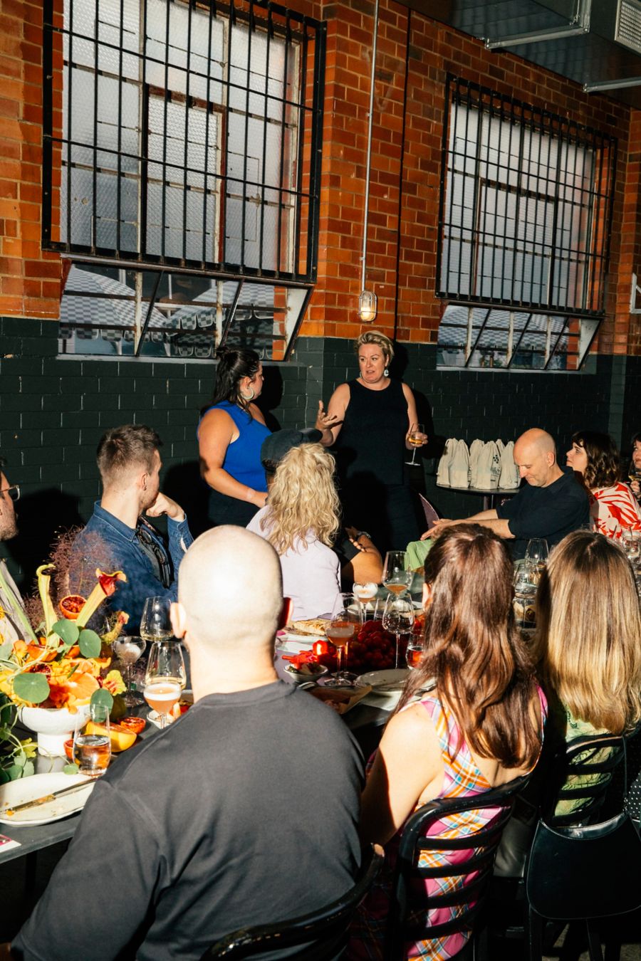 Kim Chalmers speaking to guests at Date Night with Dan's Daily event