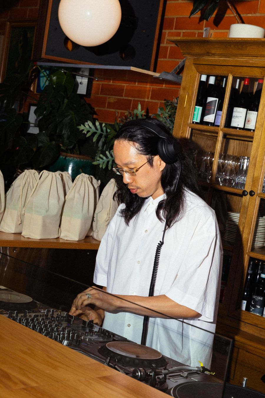 Derrick Gee DJing at Lilac Wine Bar