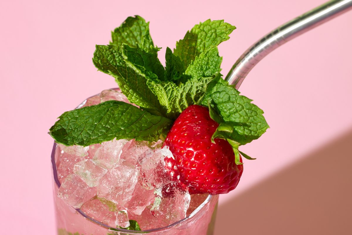 The Strawberry Mojito with mint and strawberry as garnish
