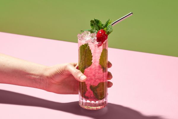 The Strawberry Mojito with mint and strawberry as garnish