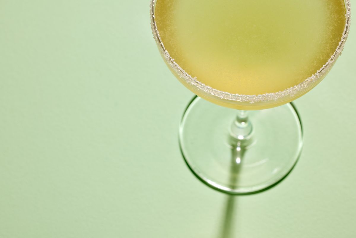 The sugar-rimmed coupe glass is key to the Sidecar cocktail