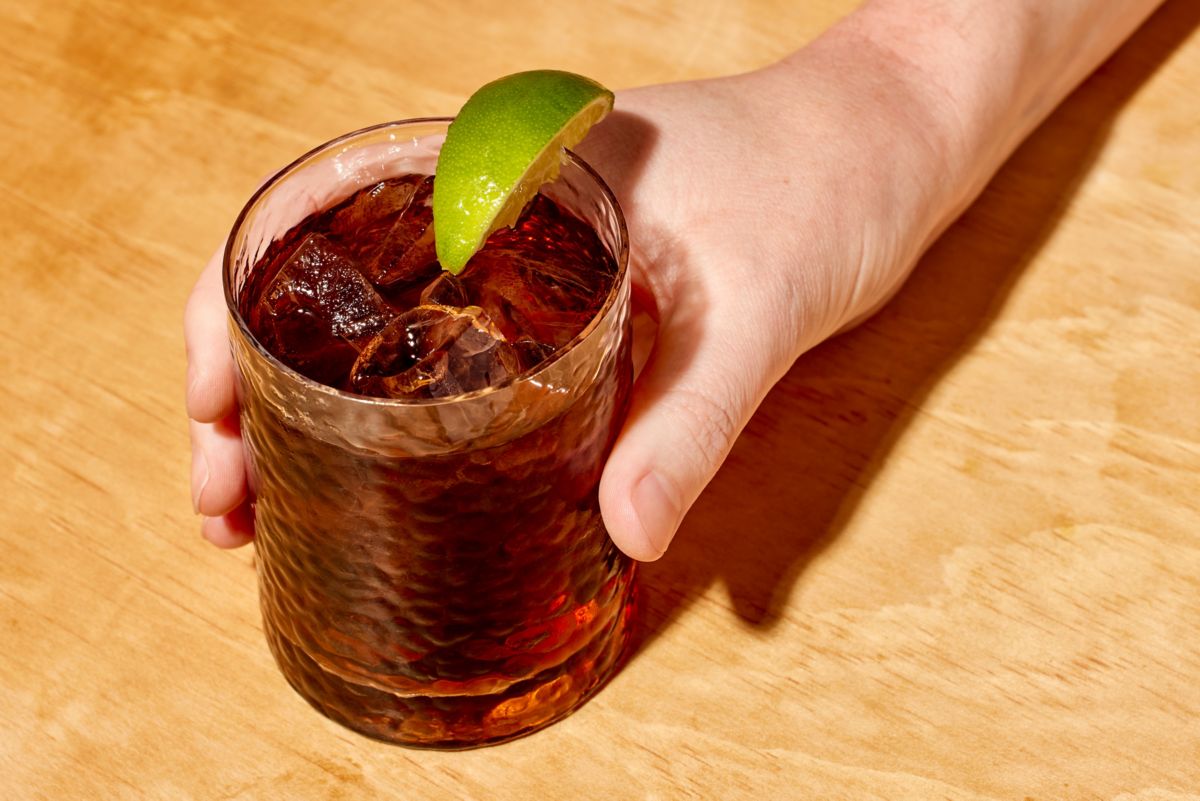 Holding a Cuba Libre