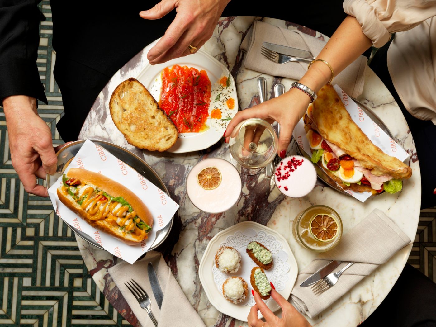 People tucking into various share plates at 55 North by Cibaria