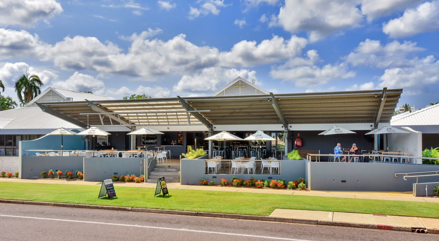 Outdoor seating at the front of the Beachfront Hotel in Darwin