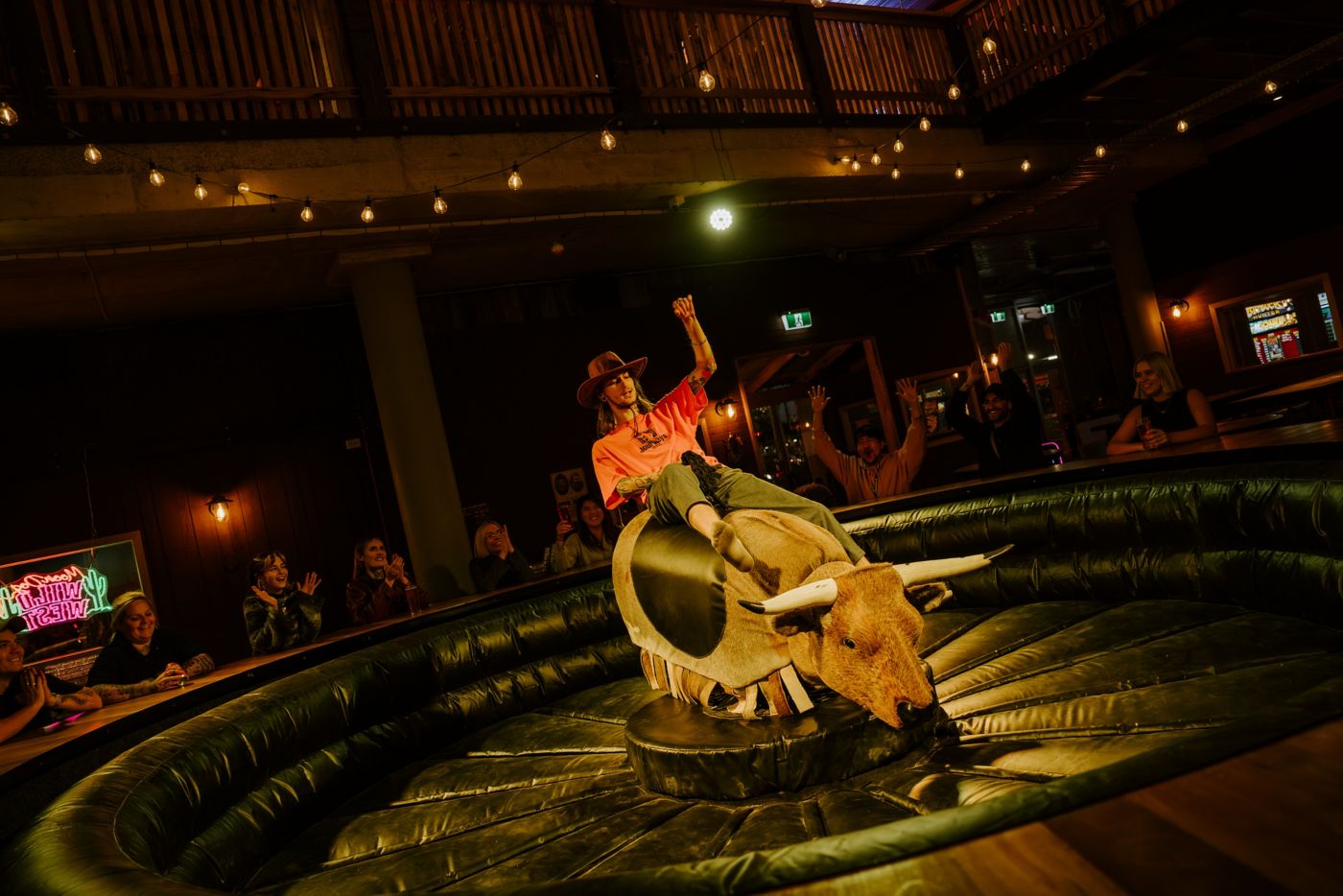 The mechanical bull is a drawcard at Moon Dog Wild West 