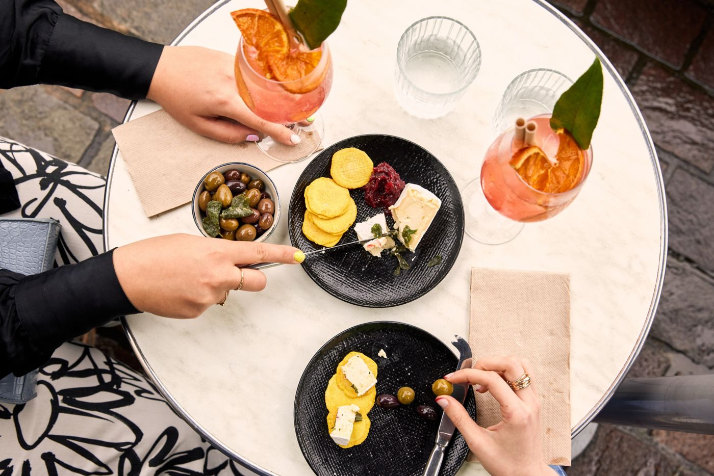People enjoying some cheese and Spritzes at Coquun in the NSW Hunter Valley