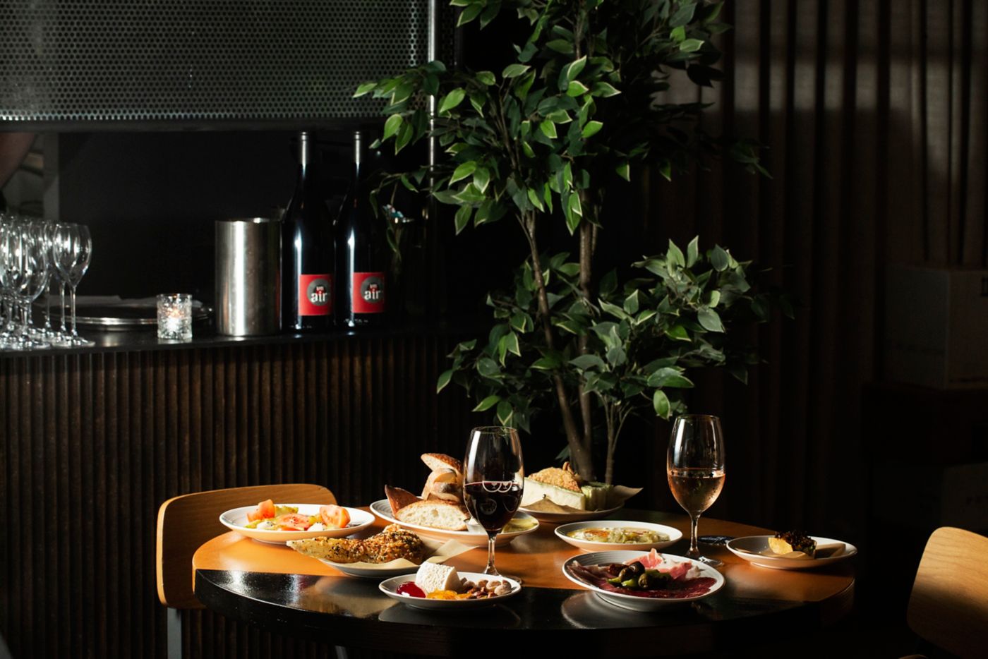 A spread of dishes and wine at Bar Rogue in Perth