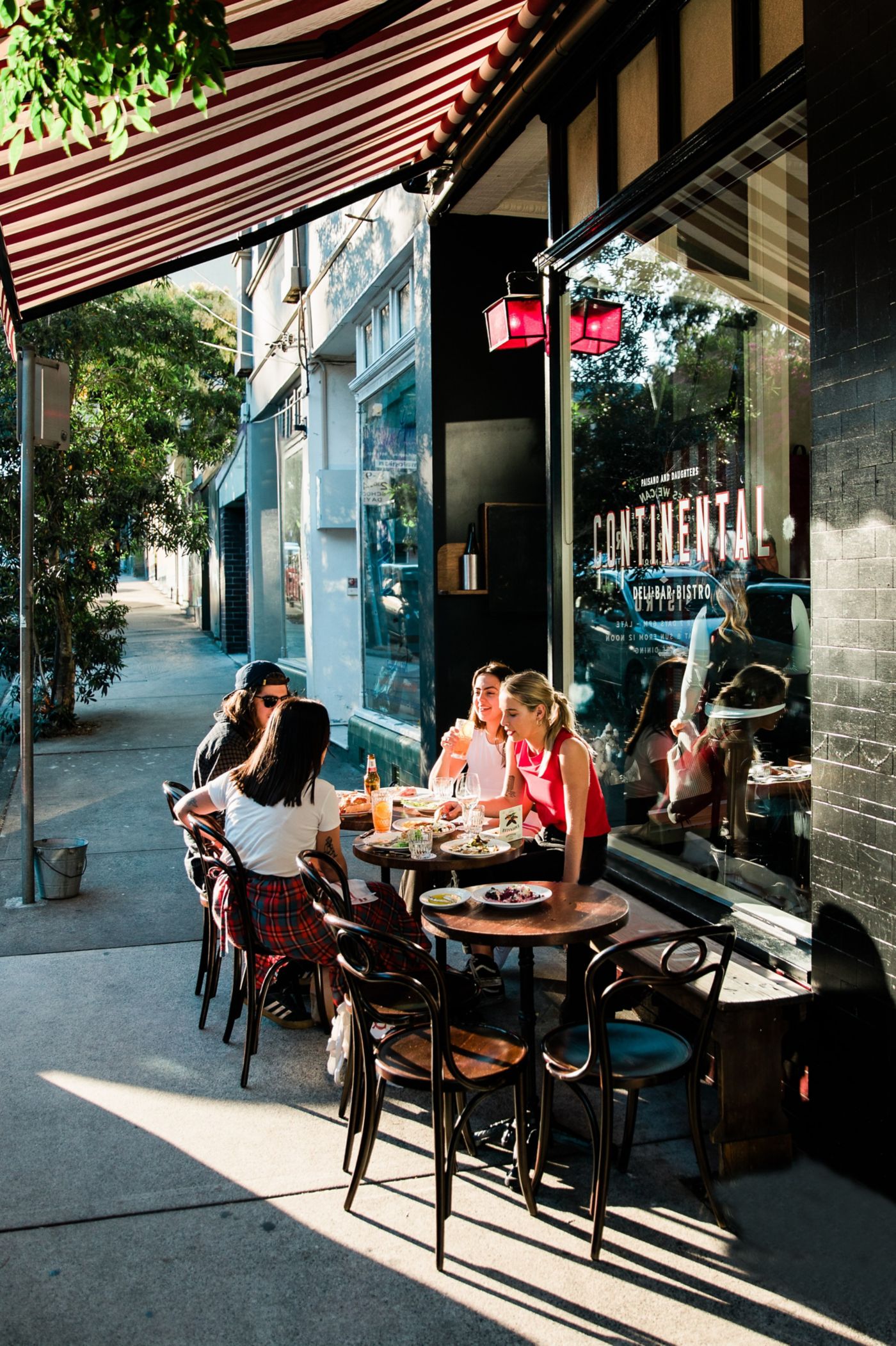 People sitting al fresco at Continental Deli in Newtown, Sydney