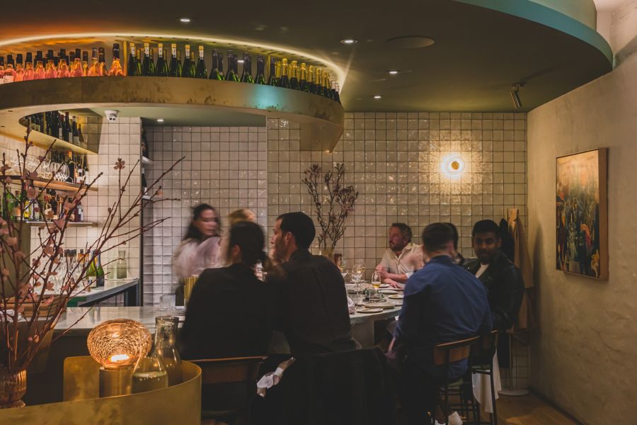 sitting area in front of bar at Gildas