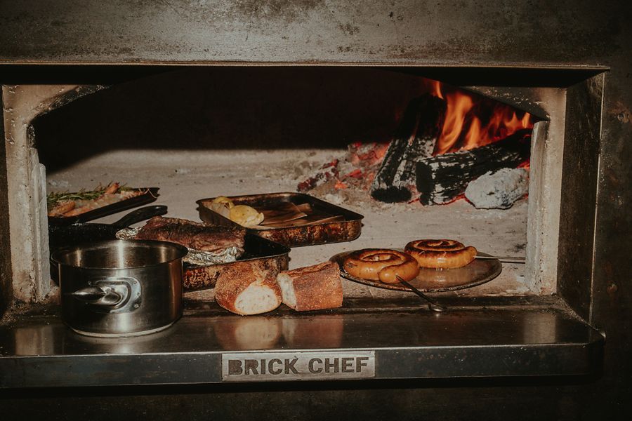 The wood fire is a central feature at Bessie's and Alma's 