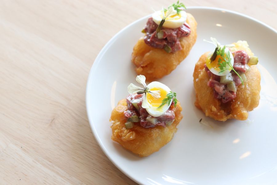 Potato cake, beef tartare and quail egg at Marla Singer