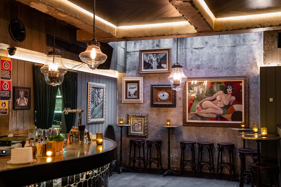 Picture frames on wall at Employees Only