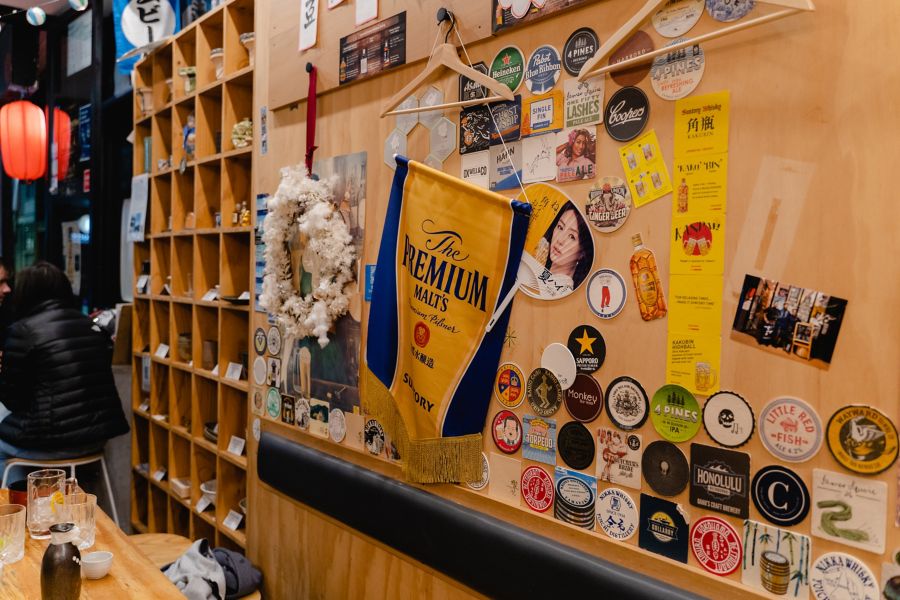 image of stickers on wall of Tachinomi