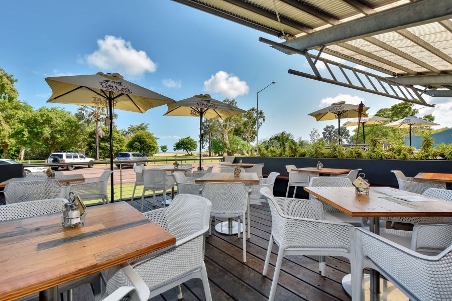 Outdoor seating at Beachfront Hotel
