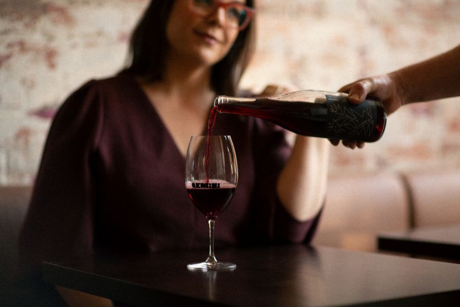 Pouring a wine at Gemini in Melbourne