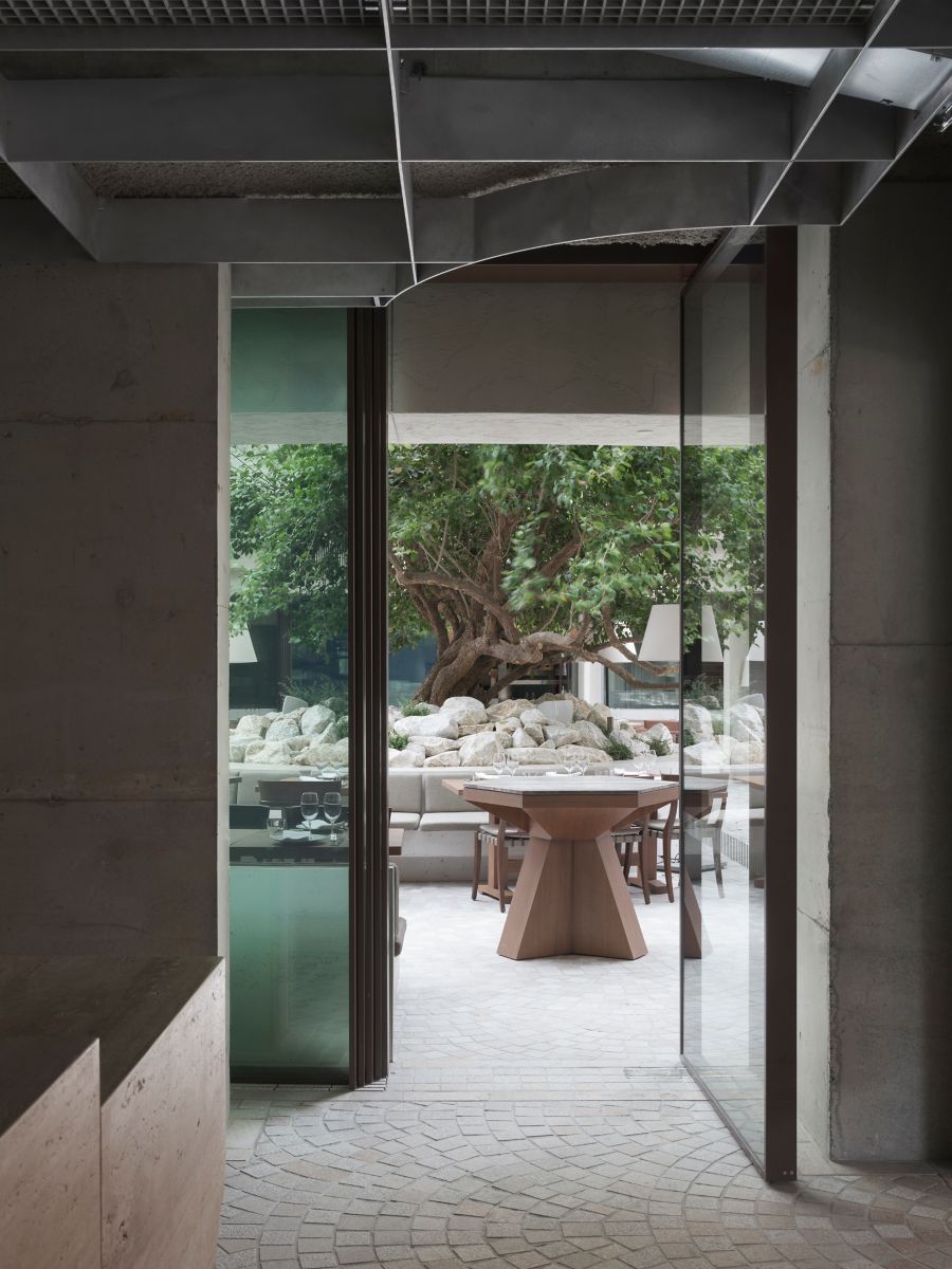 Looking out to the centrepiece of the restaurant with a retractable roof