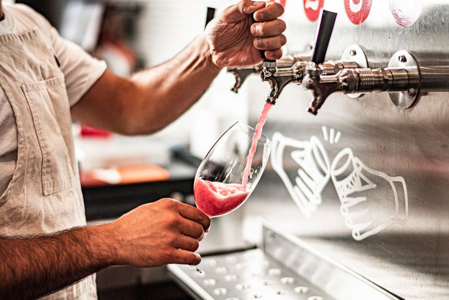 Pouring a Negroni on tap at Banco Manly