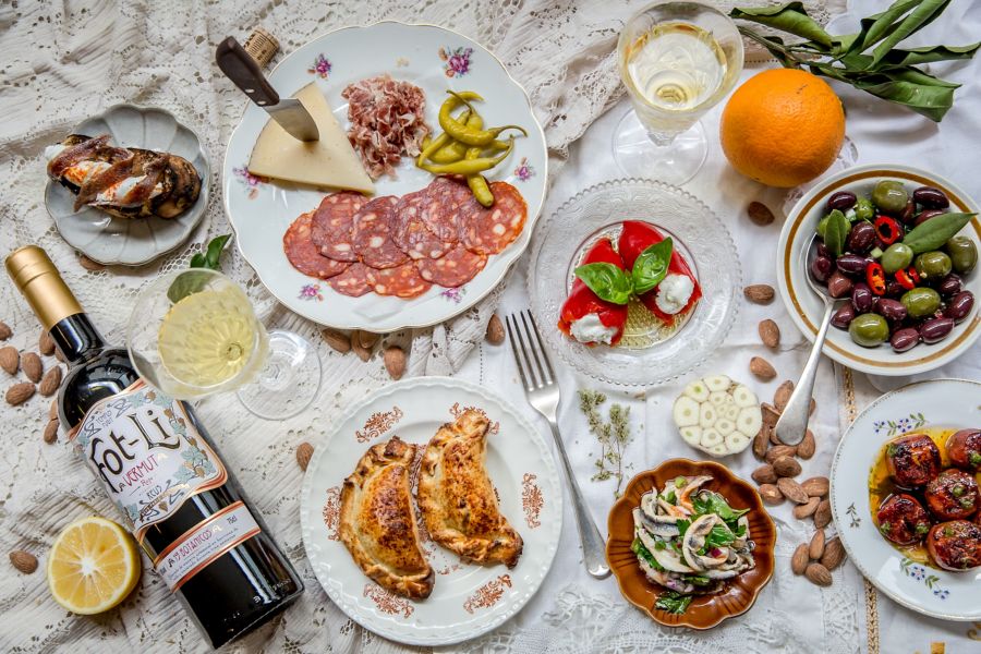 A selection of dishes and vermouth at Little Drop of Poison