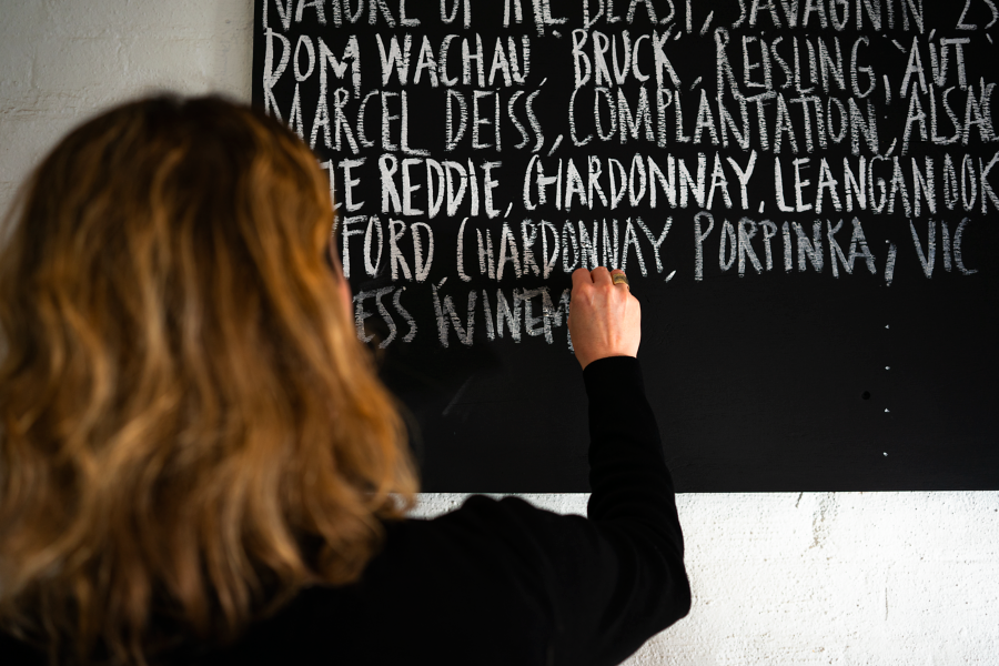 The blackboard at Kirbie lists the wine bar's specials  