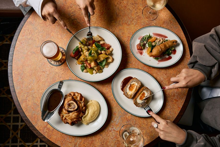 Looking over a table with several dishes on it