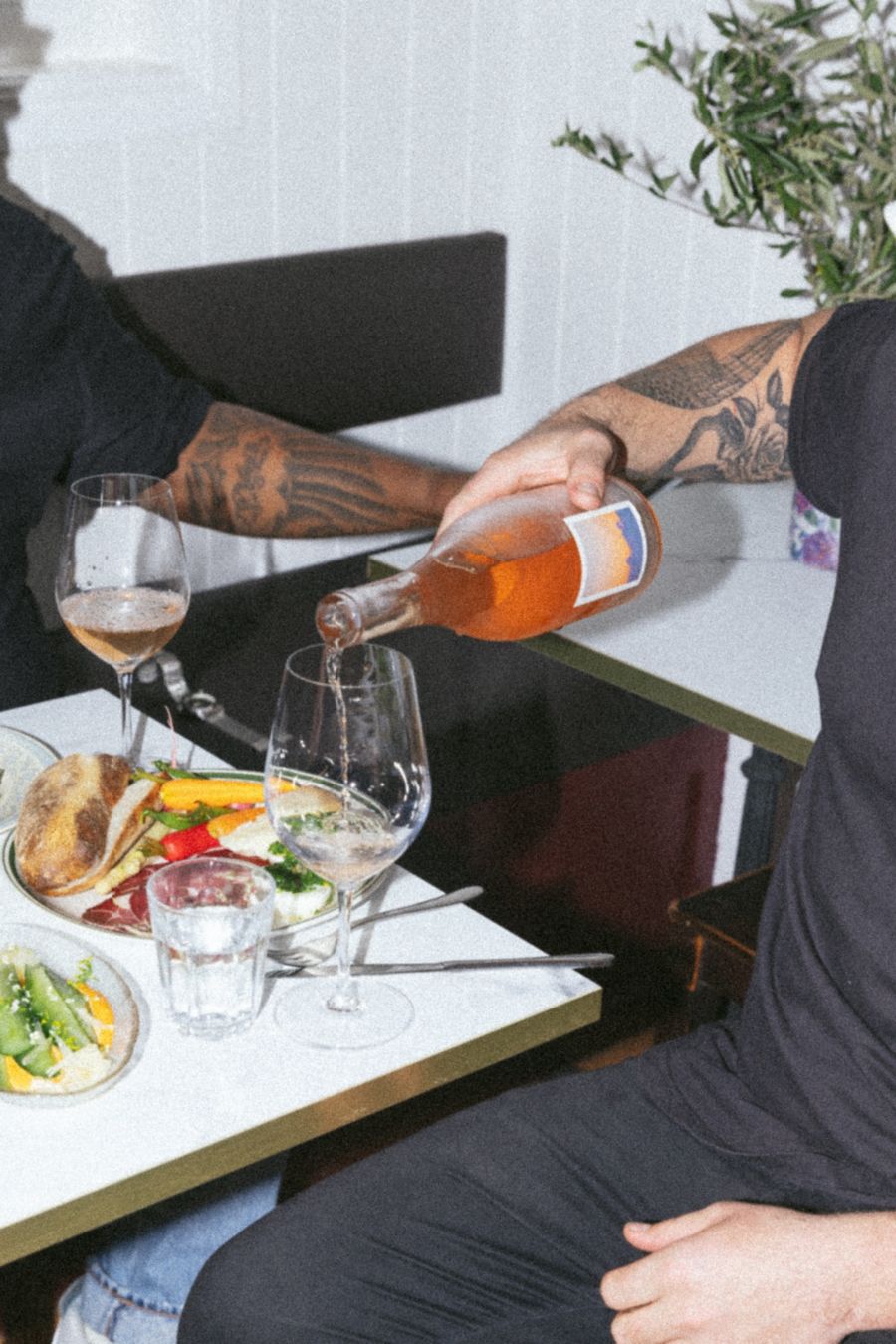 Pouring a glass of wine at Cordeaux Social Club, Brisbane