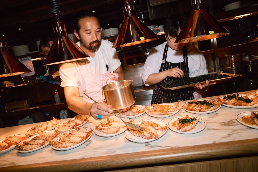 Plating up prawns at Marmont in Melbourne
