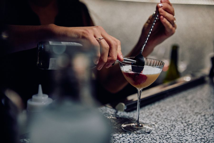 Mixing a cocktail at Patsy's in Melbourne